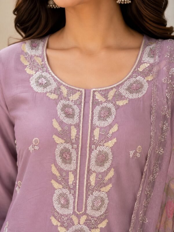 Close-up of the Meher Lavender Mist modal suit neckline with white, silver and pastel floral beadwork.